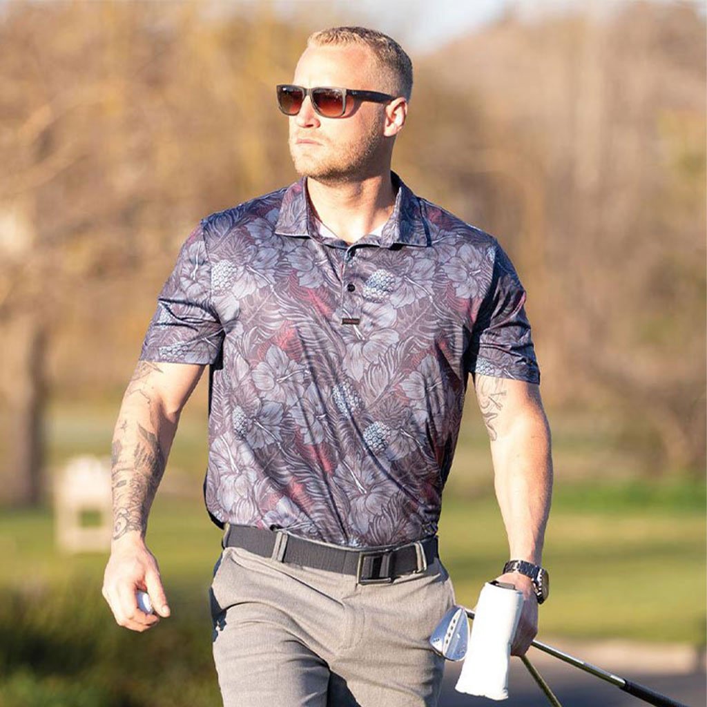 Man wearing a golf polo with floral pattern